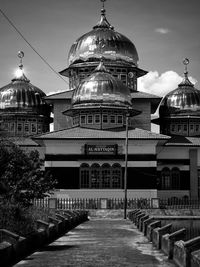 View of temple building against sky in city