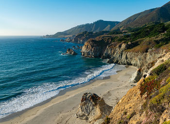 Scenic view of beach against sky