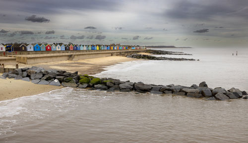 Beach huts at southwold beach in the uk adding some colour on a grey and cold day.