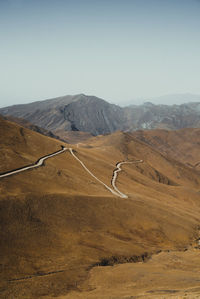 Road through the mountains and clouds