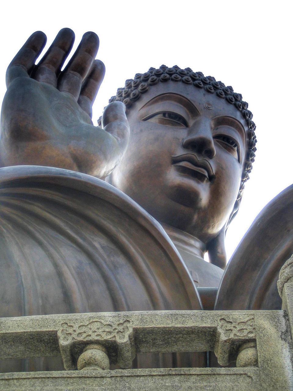 LOW ANGLE VIEW OF STATUE OF BUDDHA