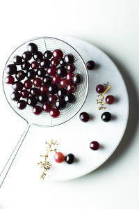 High angle view of cherries in plate