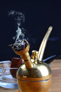 Close-up of cigarette on table