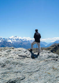 Standing on top of conical hill, view of hollyford valley and tasman sea, routeburn track