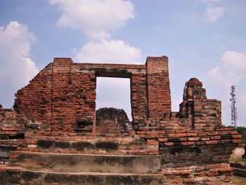 Low angle view of ruin old door in temple ayutthaya thailand. stock photo