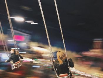 Woman standing at night