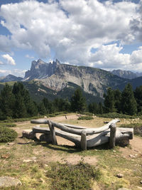 Built structure on field against sky