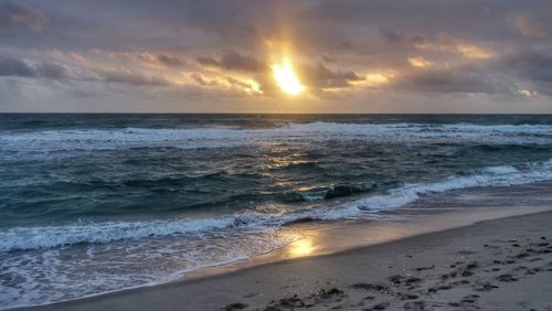 Scenic view of sea against sky during sunset