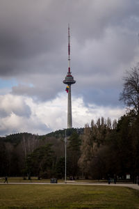 View of tower against cloudy sky