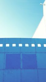 Low angle view of building against clear blue sky