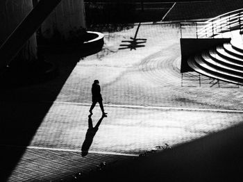 High angle view of people walking on street