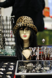 Young woman wearing mask at store