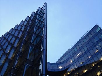 Low angle view of modern building against clear sky