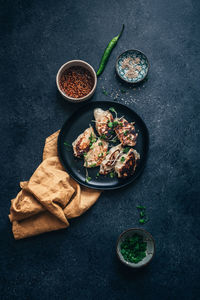 High angle view of dumplings in plate on table