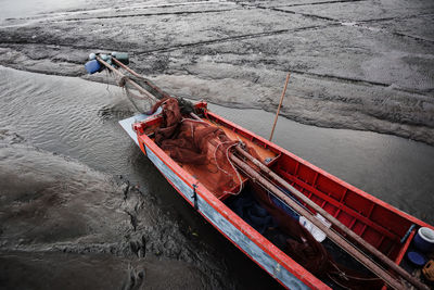 High angle view of man working on boat