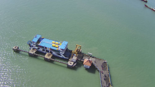 High angle view of commercial dock in sea