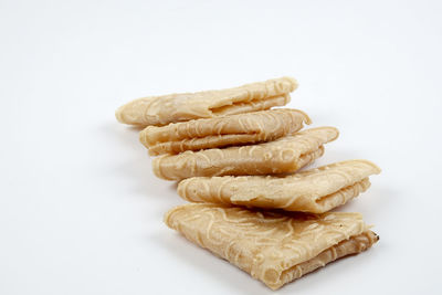Close-up of cookies against white background
