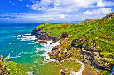 High angle view of rock formations in sea