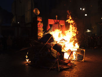Bonfire in city at night