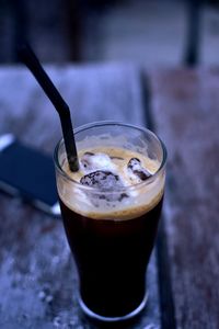 Close-up of iced coffee on table