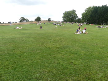 Group of people playing on field