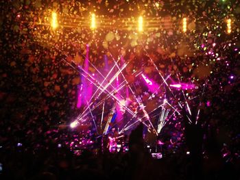 People enjoying music concert