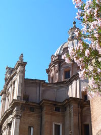 Low angle view of building against blue sky