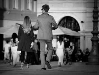 Full length of woman standing in city