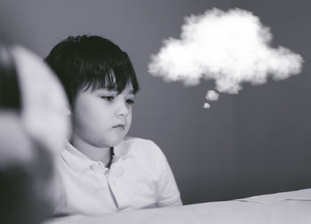 Portrait of boy looking away