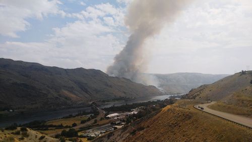 Panoramic view of volcanic landscape against sky