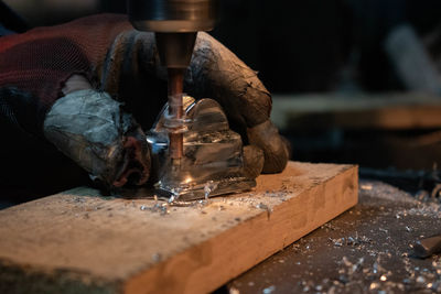 Person working on wood