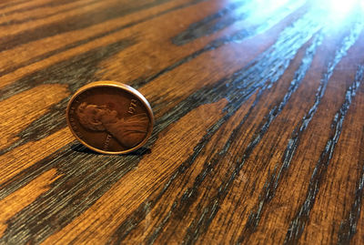 High angle view of coins on table