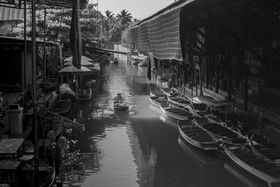 Canal amidst buildings in city