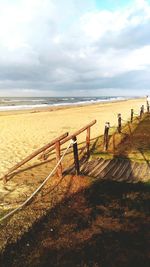 Scenic view of beach against sky