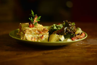 Close-up of food served in plate on table
