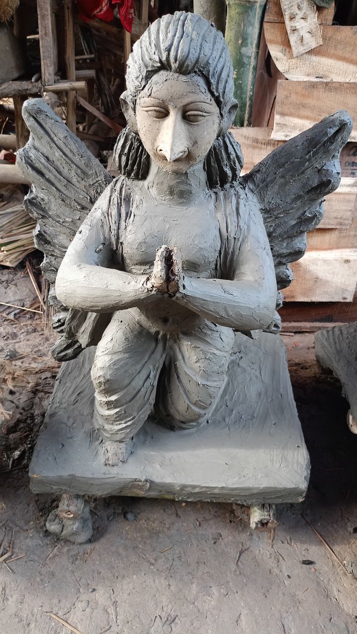 sculpture, statue, craft, monument, human representation, ancient history, representation, art, temple, religion, creativity, architecture, no people, spirituality, wood, stone carving, male likeness, belief, day, history, the past, outdoors, nature