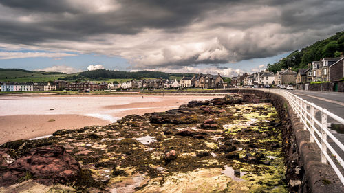 Panoramic view of beach against sky in city