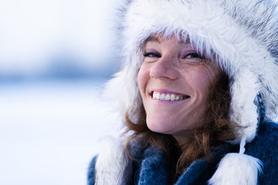 Portrait of smiling young woman