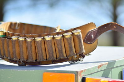 Close up of bullets in cartridge belt on box