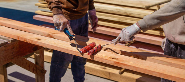 Low section of man working at workshop