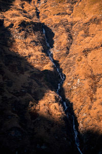 Full frame shot of water flowing through rocks