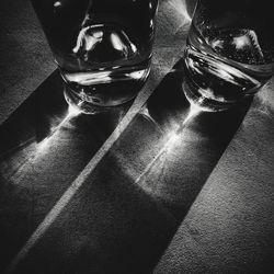 High angle view of drinking glass on table