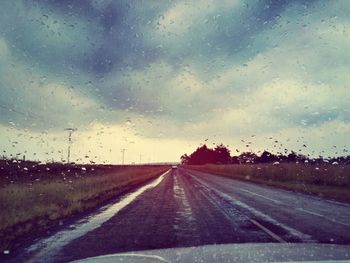 Road seen through car windshield