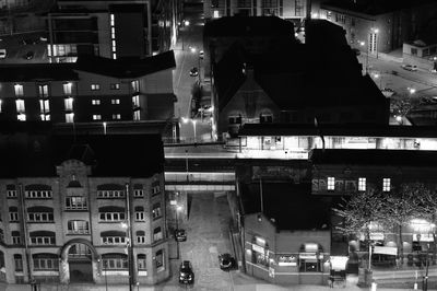 Cars on road in city at night