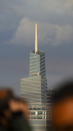 Low angle view of buildings against sky during sunset