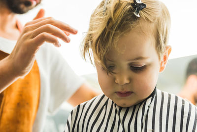 Close-up of girl playing at home