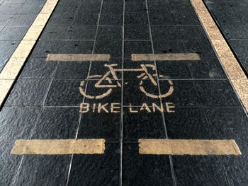 High angle view of bike lane sign