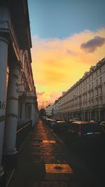 View of city against sky during sunset