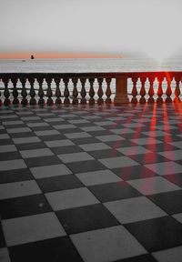 Zebra crossing on sea shore against clear sky