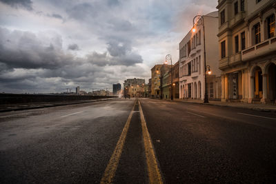 Surface level of road by buildings during dusk